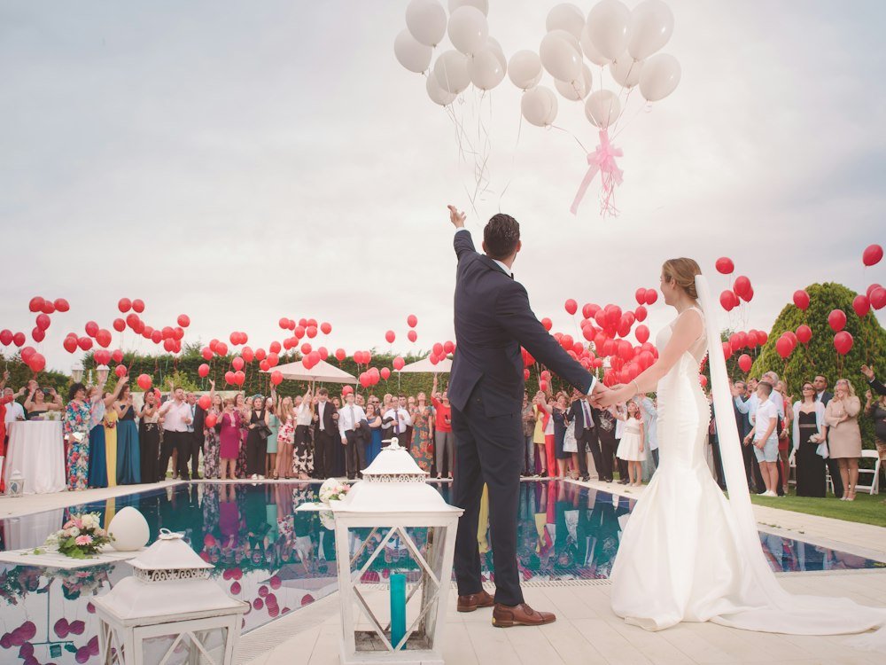 Couple exchanging rings